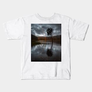 Reflection of a rainbow at mcmasters lagoon on the nsw central coast Kids T-Shirt